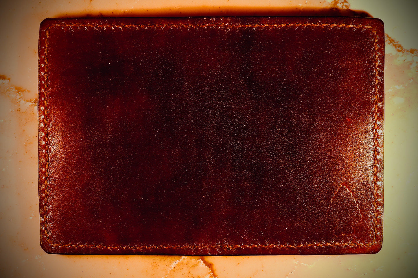 Vertical bi-fold wallet